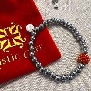 Never worn Rustic Cuff silver and orange bracelet